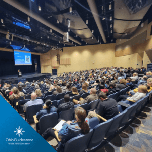 Auditorium of parents watching presentation